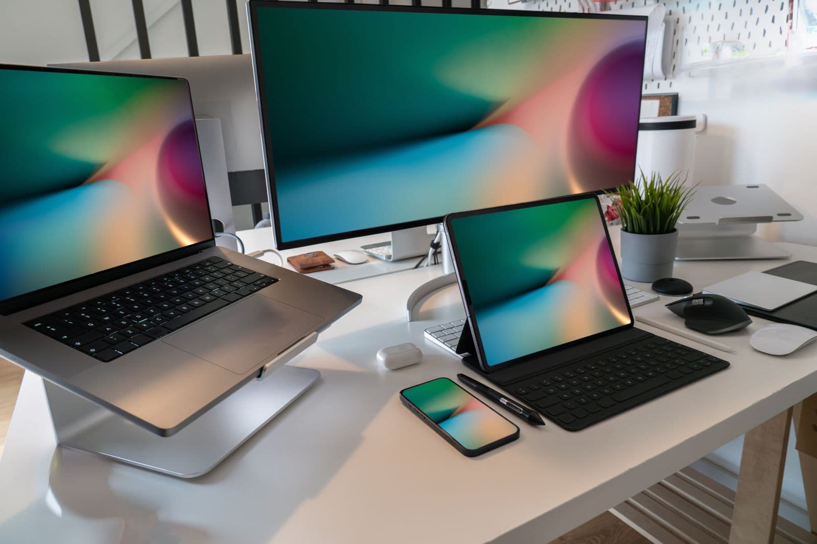 Laptop, tablet and smartphone on the same desk